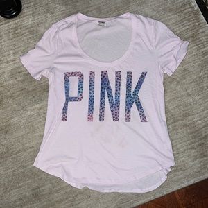 PINK shirt with leopard pastel writing.